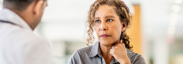 Woman speaks to professional