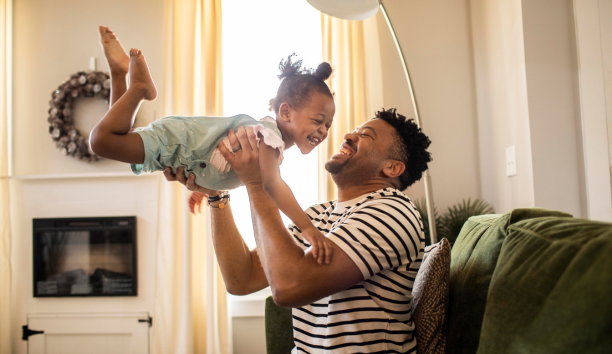 Dad plays with daughter