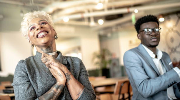 Two employees celebrate